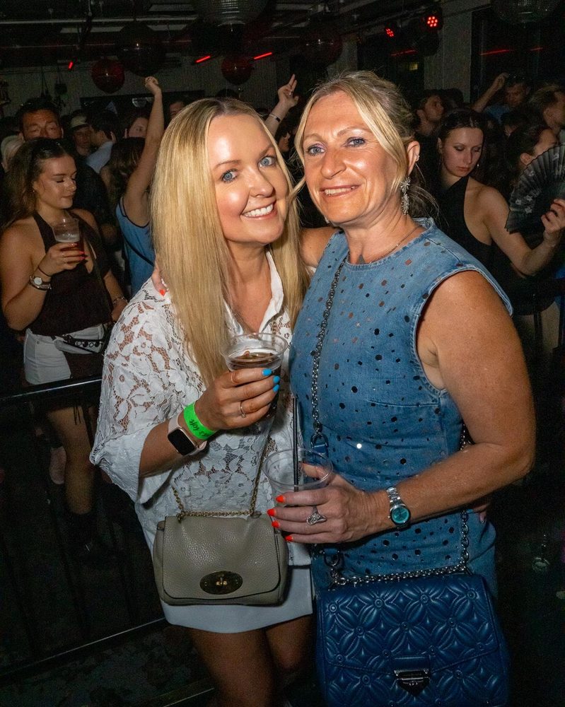 Melanie (in white) with family at the You & Me launch party